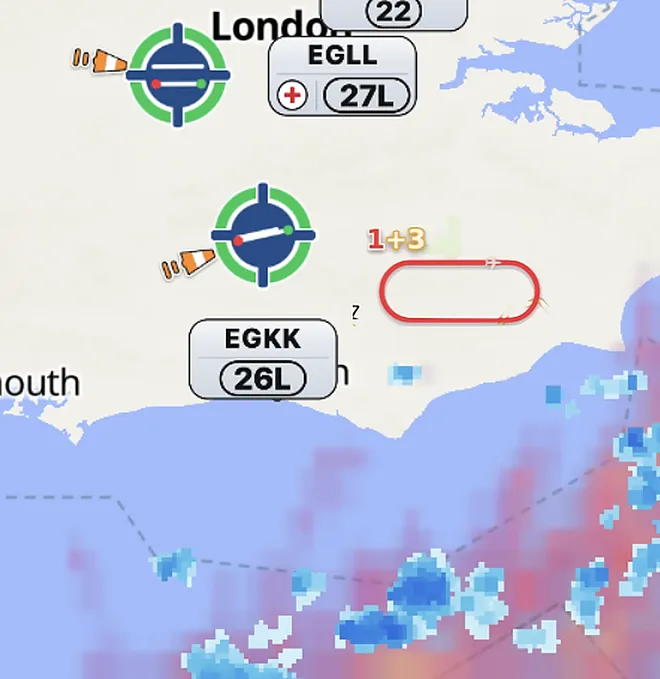 A hold south-east of Gatwick, red ring on an emergency in progress